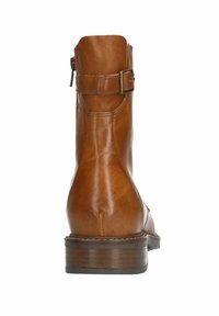 Brown leather ankle boot featuring a secured buckle, smooth texture, rounded shape, and a low stacked heel for stability.
