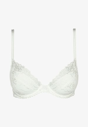 White lace bra with underwire, lightly padded cups, and adjustable straps. Features floral patterns along the edges and a small decorative center.