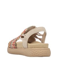 Texturierte, mehrfarbige gewebte Oberseite mit hellbraunen Wildlederriemen und gepolsterter Innensohle auf einer Gummisohle mit strukturiertem Profildesign.