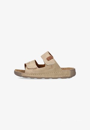 Sandalia de cuero beige con dos correas ajustables, costuras decorativas y suela texturizada para mayor agarre. Diseño de punta abierta con un ajuste amplio.