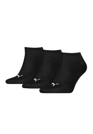 Calcetines negros hasta el tobillo hechos de un material suave y elástico. Tres pares con un acento de logo blanco cerca del tobillo. Ajuste clásico y ceñido.