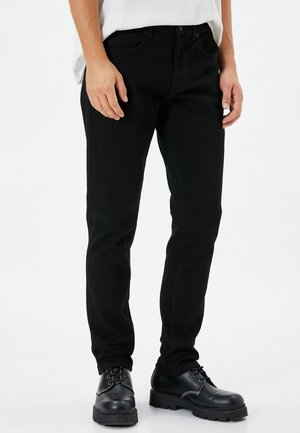 Vaqueros tapered - black