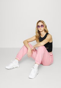 Ellesse VELAM - Calças de fato de treino - pink