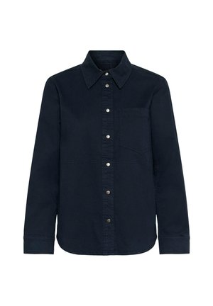 Tumesinine nööbisärk, mis on valmistatud tugevatest kangast, millel on terav krae, rinnatasku ja rõngastikke aktsendid ees.