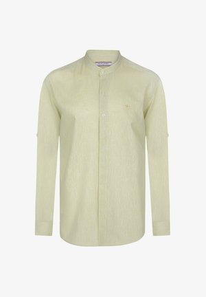 Hele kollane pikkade varrukatega särk mandariinikaelusega, millel on peen tekstuur ja väike tikandloga rinnaosas.