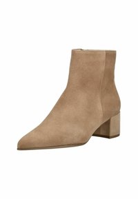Beige suede ankle boot with a pointed toe and a chunky block heel. The design features seamless sides and a back zipper for easy wear.