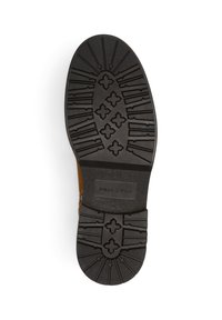 Semelle en caoutchouc noire d'une chaussure marron avec des motifs de crampons profonds, nom de la marque "Marc O'Polo" et taille 42 sur fond blanc.