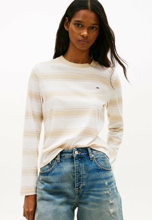 - Bluzka z długim rękawem