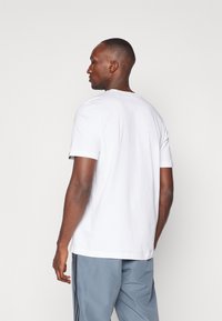 adidas Performance COPA SIGNATURE GRAPHIC - Tricou cu imprimeu - white