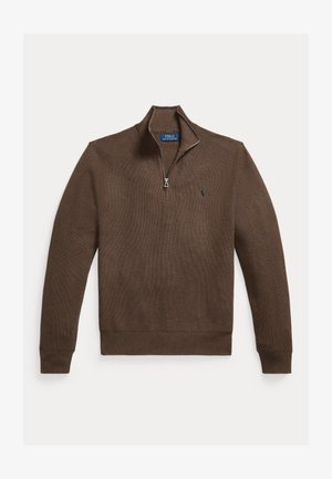 Pruun põlvega kootud pullover neljandikulise luku, soonikkoes mansettide ja alaäärega ning väikese tikitud logoga vasakul rinnal.