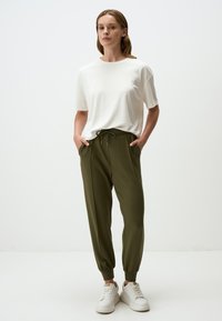 JOGGER  - Trainingsbroek - khaki