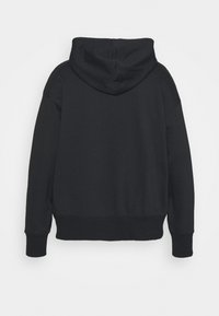 Black hoodie with a soft texture, long sleeves, and a relaxed fit. Features a centered hood and ribbed cuffs and hem.