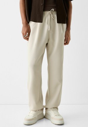 Verryttelyhousut - sand