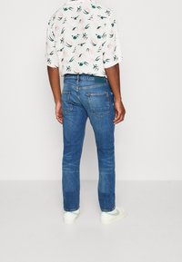 Scotch & Soda Vaqueros pitillo - metallic blue