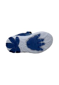 Suola della scarpa con una tomaia blu navy e un fondo bianco testurizzato, decorata con un motivo floreale e un design unico simile a una zampa.