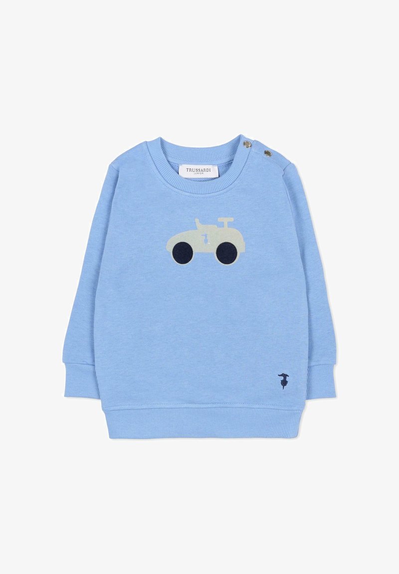 Felpa azzurra chiara in tessuto morbido, con un disegno di trattore verde pallido e dettagli blu navy. Include bottoni sulle spalle per una facile vestibilità.