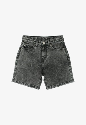 Mustad happepesuga teksapüksid ees nööp, tõmblukuga sulgumine, vöökinnituste ja viie taskuga mustril valgel taustal.