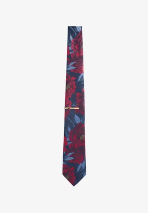 Navy blue tie with large red floral pattern and gray leaves, featuring a gold-colored tie clip.