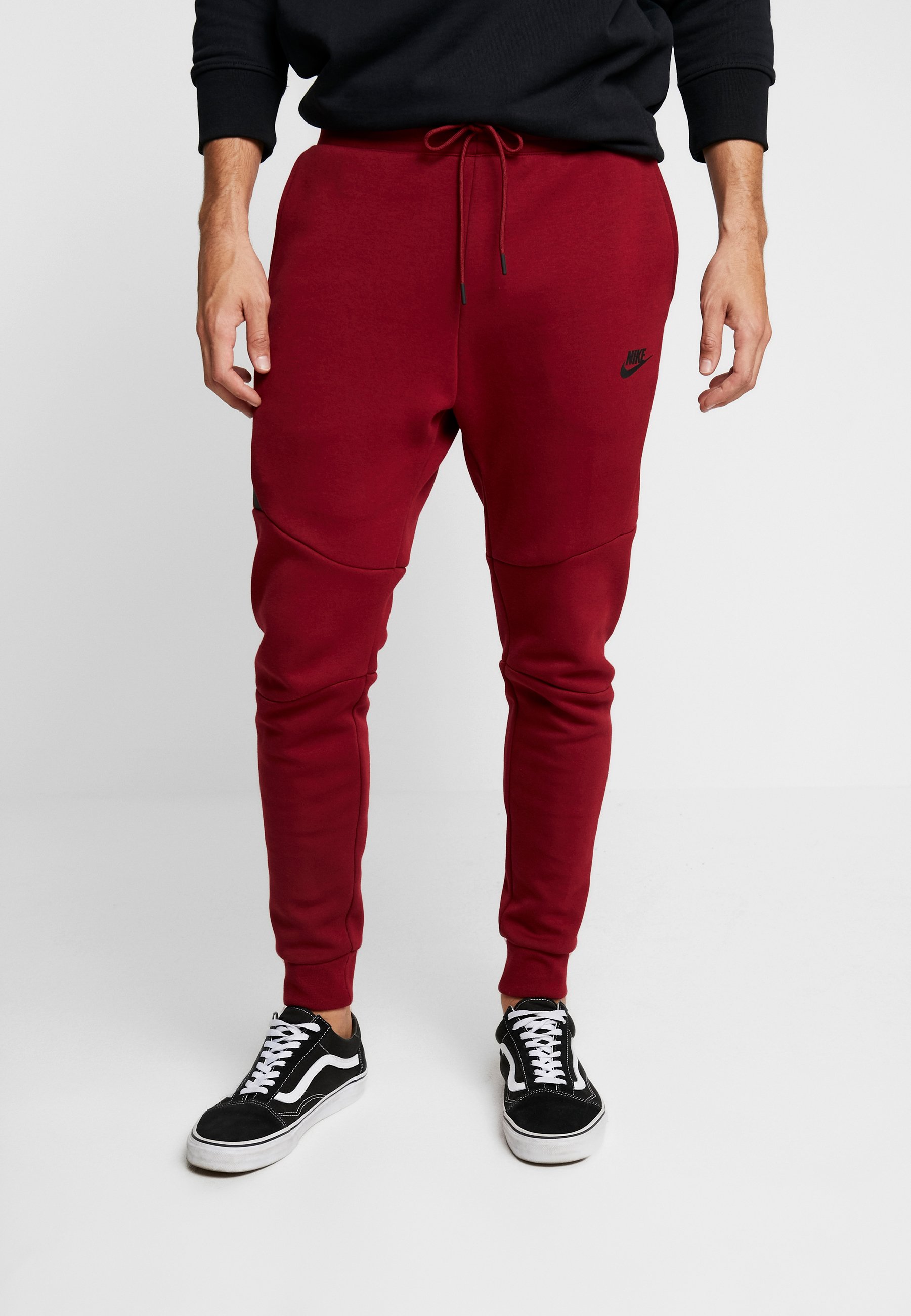 red nike tech tracksuit