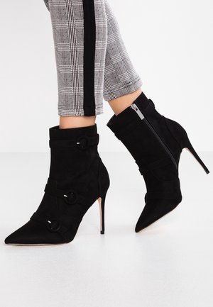 Bottines à talons hauts - black