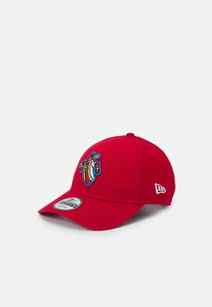 Red baseball cap with a colorful embroidered cartoon superhero hot dog on the front and a white logo on the side.