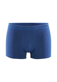 Siniset bokserit, jotka on valmistettu pehmeästä puuvillasekoitteesta, sisältävät hyvin istuvan vyötärönauhan, litteät saumat ja muotoillun pussin tuen tarjoamiseksi.