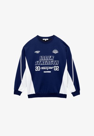 Navy blue huppari, jossa on valkoiset sivupaneelit, "INNER STRENGTH" -grafiikka suuressa fontissa ja logoja. Ribattu kaulus ja hihansuut.