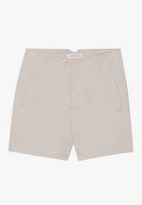 Lyhyt vaaleanbeige housut, jotka on valmistettu sileästä kankaasta. Ominaisuuksina on tasainen etuosa, jossa on painekaulus ja kaksi sivutaskua.