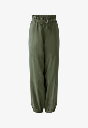 High-waist olive green pants with a paperbag waist, matching belt with silver buckle, and elasticized cuffs at ankles.