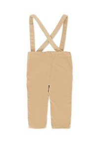 Salopette beige avec des bretelles en forme de X, fabriquée en tissu doux. Caractéristiques d'une taille élastique et de jambes fuselées, conçue pour un port facile et un confort optimal.