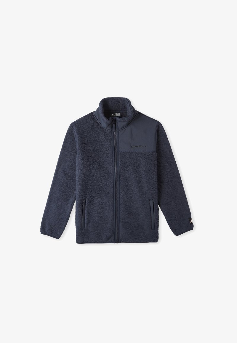 Veste en polaire marine avec fermeture éclair à l'avant, col montant, deux poches latérales et un panneau uni sur la poitrine. Présente un tissu texturé et doux.