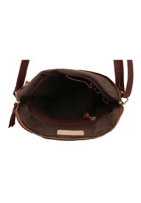 Brown leather shoulder bag with a zipper closure, featuring a spacious interior and a small zip pocket. The lining is dark fabric.