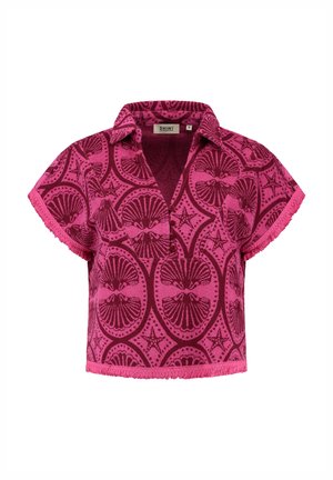 Short-sleeve, pink shirt with patterned fabric featuring shells and stars. Notable fringe detailing along the sleeves and hem.