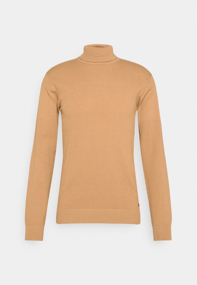 Beige Rollkragensweater mit strukturiertem Muster, langen Ärmeln und gerippten Bündchen sowie Saum. Der Stoff wirkt weich und dehnbar.