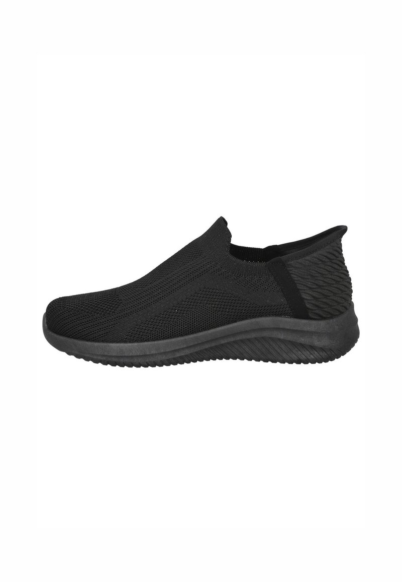 Zapatillas negras de tipo slip-on con parte superior de malla transpirable, parte trasera texturizada y suela de goma acolchada para mayor comodidad y flexibilidad.