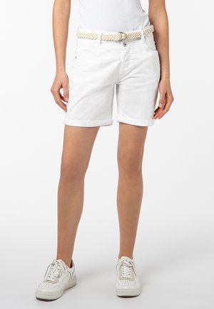 White denim shorts with rolled cuffs, featuring a braided beige belt, metal button closure, and front pockets. Worn with white sneakers.