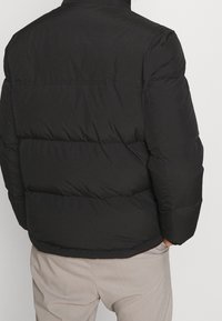 Tommy Hilfiger Gewatteerde jas - black