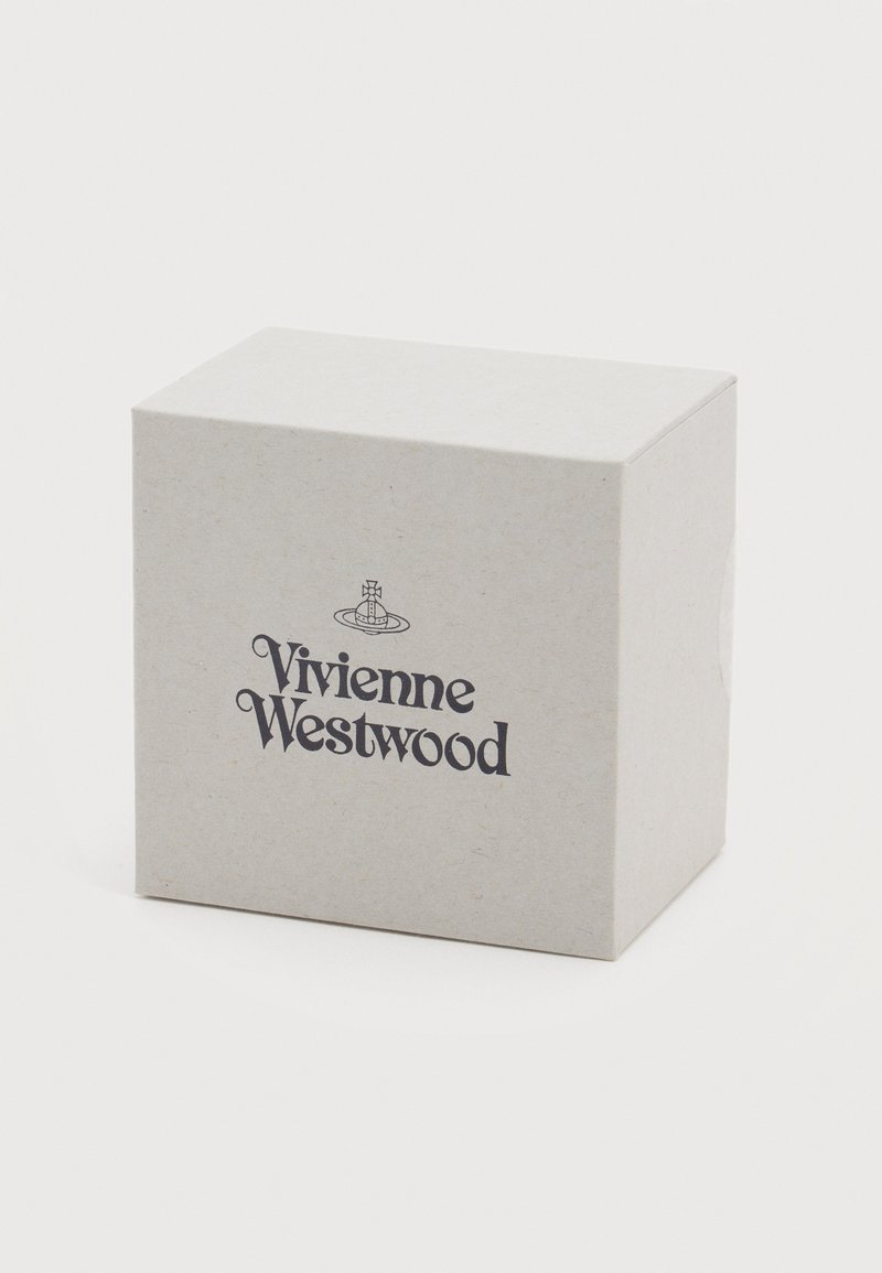 Beige, cube-shaped Vivienne Westwood packaging box with logo and orb emblem centered on front side against white background.