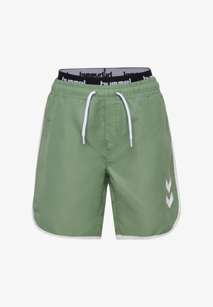 Gröna simbyxor med vit dragsko, med vita sidodetaljer och chevronmönster på sidorna. Elastisk midja.