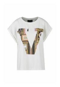 White short-sleeve t-shirt featuring a large patterned "V" graphic in gold, pink, and black, with a smooth, cotton-like texture.