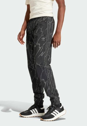 Pantalones deportivos - black
