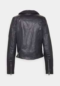 Black leather jacket with a cropped design, notched collar, and long sleeves featuring zippered cuffs and a textured finish.