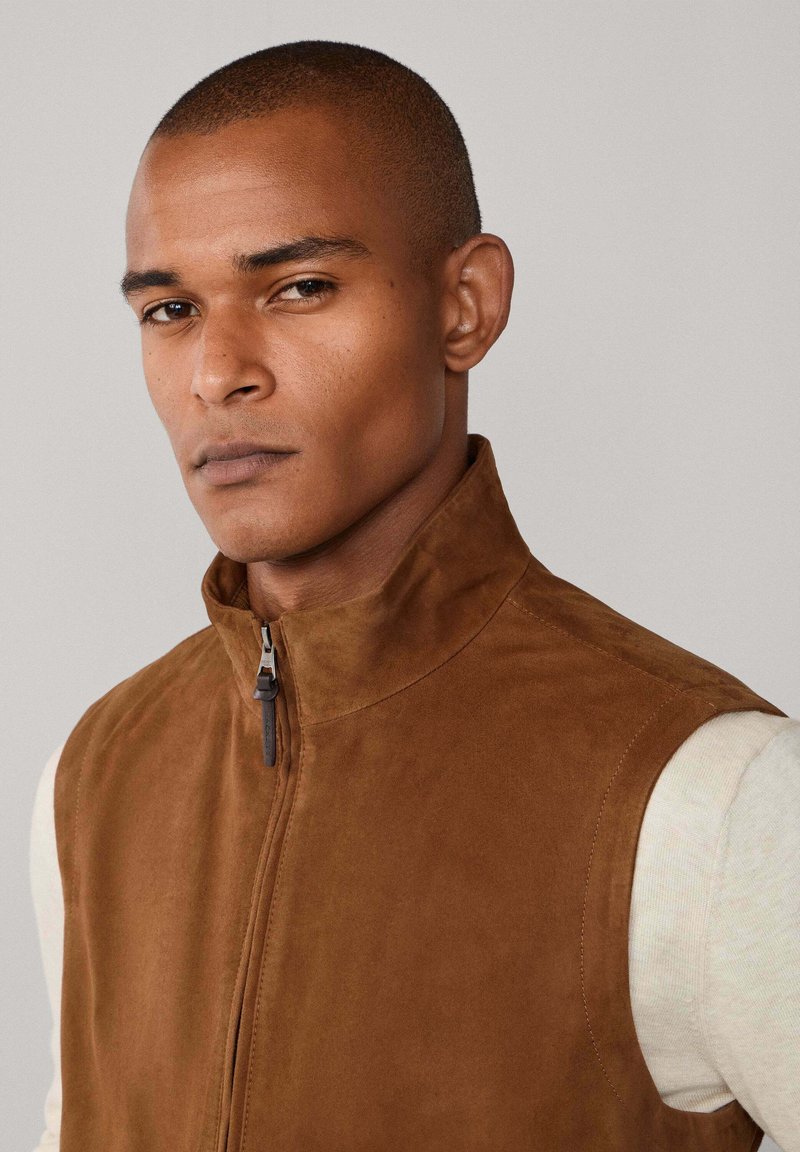 DongBao Veste en cuir sans Manche Homme,gilet de chasse,Gilet de Moto, Gilet Cuir Biker