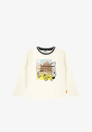 White long-sleeve t-shirt featuring a graphic of a vintage car and a character. Ribbed black and white neckline, soft cotton fabric.