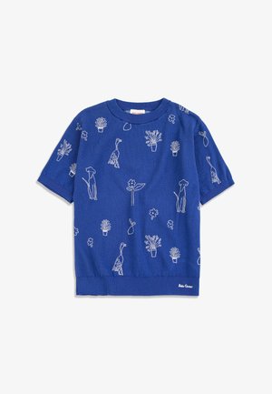 Blue short-sleeve knit top with white outlined patterns of dogs, birds, potted plants, flowers, and leaves scattered across the fabric.