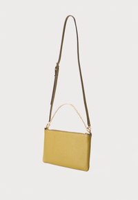 Yellow leather shoulder bag with a smooth texture, rectangular shape, chain and strap accents, featuring a zip closure.