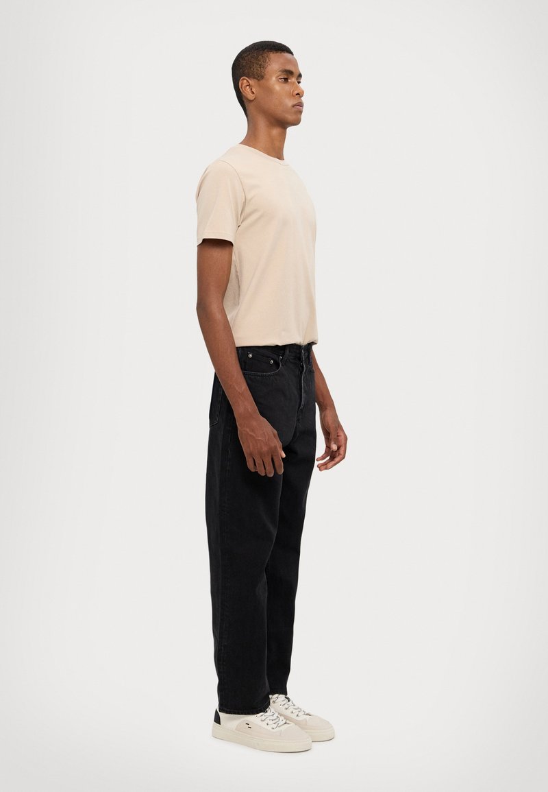 Ksubi ANTI  - Calças de ganga de corte relaxado - black