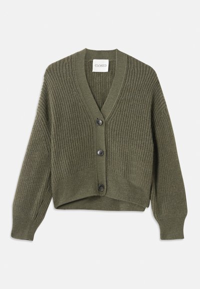 Olive green knitted cardigan with a V-neck, three buttons, and ribbed texture. Features cropped length and drop shoulder design.