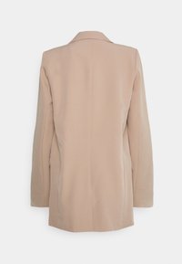 Beige wool-blend blazer, tailored design, single-breasted with a notched collar, back vent, and structured shoulder silhouette.