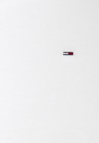 White cotton T-shirt with a small embroidered logo featuring a red, white, and blue horizontal stripe on the upper left side.